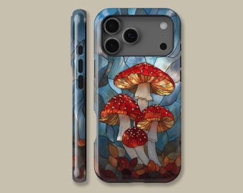 May include: A phone case featuring a stained-glass style design of red and white spotted mushrooms with a blue background. The case has a glossy finish and a protective bumper. The side of the case is a gradient of blue and brown.