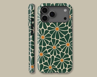 May include: A phone case featuring a floral design. The case is dark green with a cream background and orange flower centres. The pattern is repeated on the side. The phone case has a camera cutout.