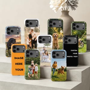 May include: A collection of custom phone cases featuring various printed photographs of families, dogs, and horses. One orange case displays the text IMAGE HERE YOUR, while a black case features the text CUSTOM YOUR PHOTO / TEXT in white lettering.