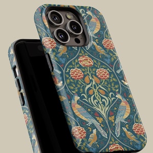 May include: A teal phone case featuring a repeating pattern of colorful birds, flowers, and foliage. The design includes orange, yellow, and blue birds, with red and orange flowers. The case is shown on a black phone.
