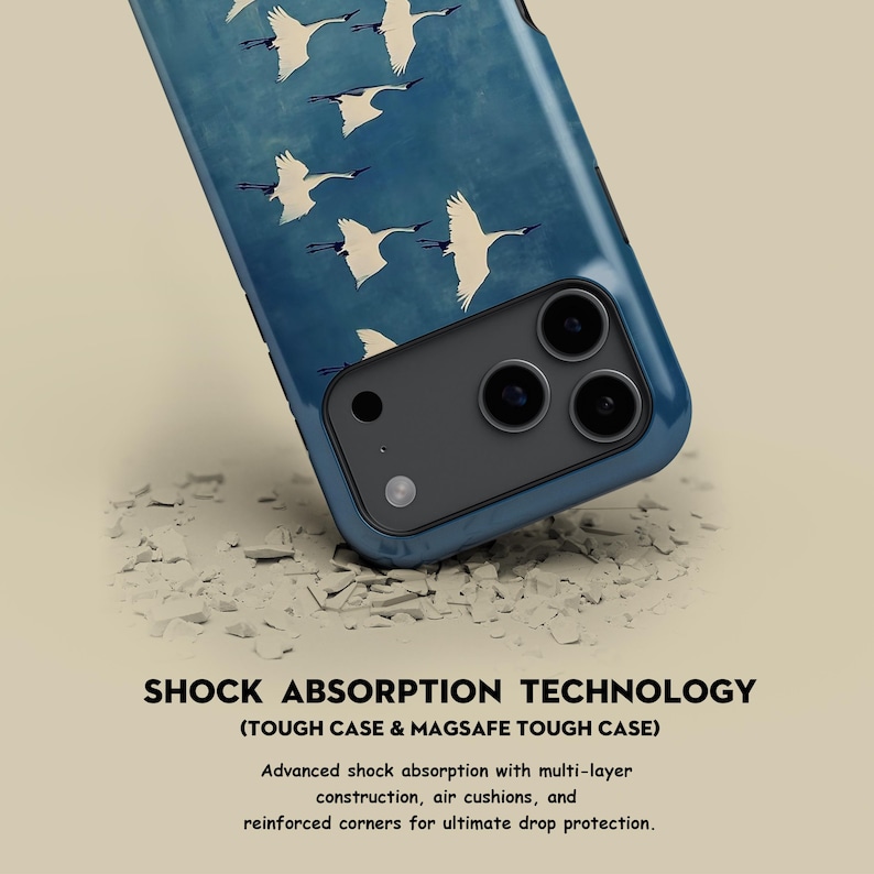 May include: A blue phone case with a white bird pattern. The case has a dark blue border and a black camera module. Text at the bottom reads "SHOCK ABSORPTION TECHNOLOGY".