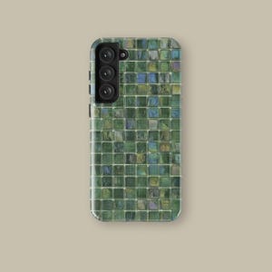 May include: A green and blue mosaic phone case with a triple camera lens.