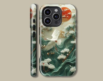 Peut inclure: Une coque de téléphone avec une grue blanche volant au-dessus d'un motif de vague verte et bleue. La coque a un soleil rouge et orange avec une branche d'arbre dans le coin supérieur droit.