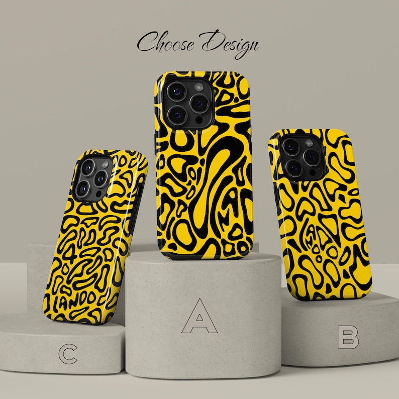 May include: Yellow and black patterned phone cases in three different orientations. The cases are displayed on gray pedestals, with the text "Choose Design" above. Each case has a unique black abstract design on a yellow background.