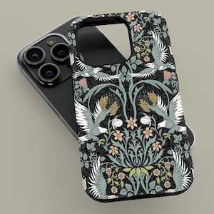 May include: A black phone case featuring a detailed floral and bird pattern. The design includes stylized birds with outstretched wings, flowers, and foliage in shades of gray, green, and peach. The case is shown on a black smartphone.