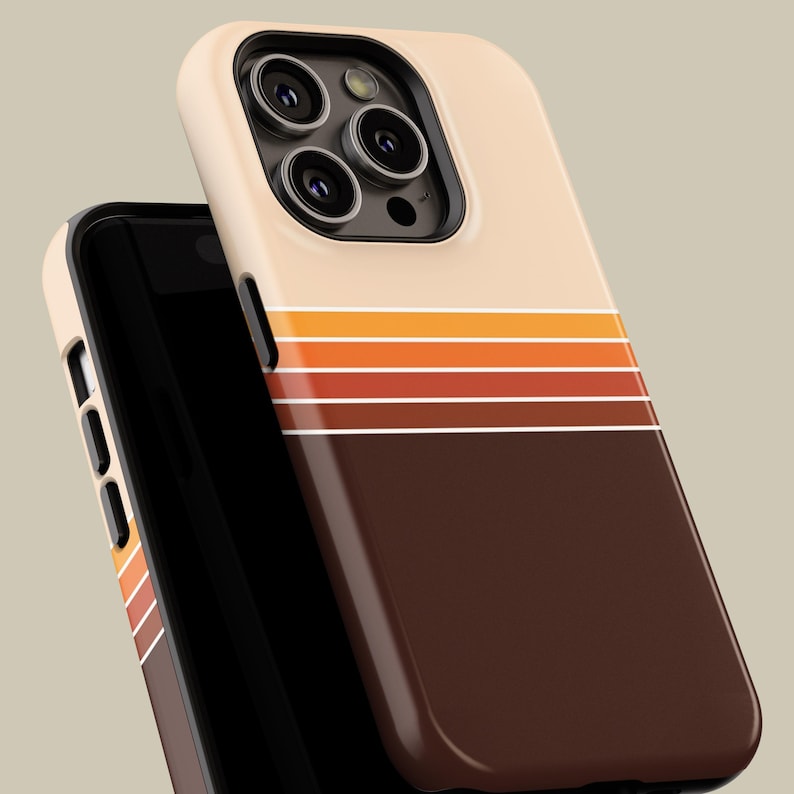 May include: A beige and brown phone case with a retro design. The case features horizontal stripes in shades of orange and brown, with a solid brown bottom section. The phone case is designed to fit a smartphone.