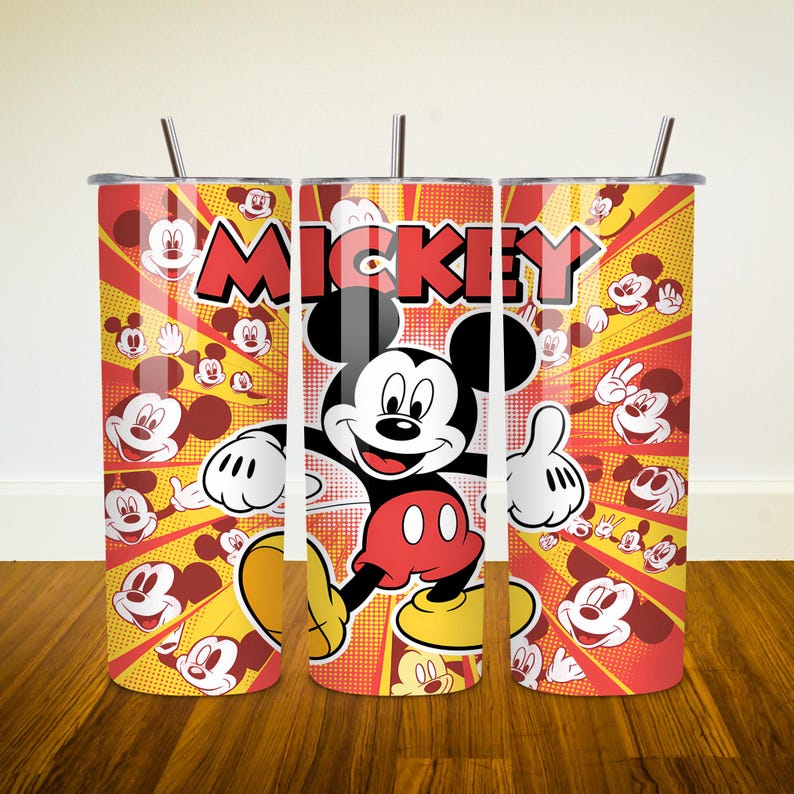 May include: Three stainless steel tumblers with Mickey Mouse designs. The tumblers are red, yellow, and black with a comic book style background. The middle tumbler features a large image of Mickey Mouse with the word "Mickey" in large letters.