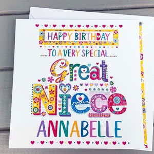 May include: A colorful birthday card for a great niece, featuring the words "Happy Birthday" and "Great Niece Annabelle." The card has a white background with decorative floral and heart accents. Includes a matching envelope.
