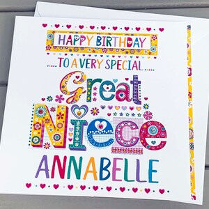 May include: A colorful birthday card for a great niece, featuring the words "Happy Birthday" and "To a Very Special Great Niece Annabelle." The card has a white background with decorative floral and heart accents.