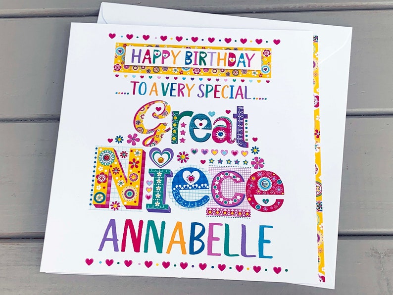 May include: A colorful birthday card for a great niece, featuring the words "Happy Birthday" and "To a Very Special Great Niece Annabelle." The card has a white background with decorative floral and heart accents.