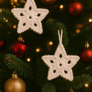 May include: White crochet star Christmas ornaments hanging on a decorated Christmas tree. The tree also features red and gold ornaments. The star ornaments have a five-point design with a central hole and smaller holes.