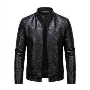 May include: A black jacket featuring a textured crocodile skin pattern throughout the exterior. The garment has a stand-up collar, long sleeves, and a straight hemline. The front is open, revealing a smooth black interior lining and a small label.