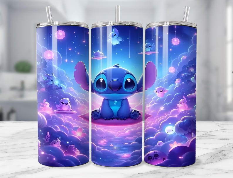 May include: A set of three stainless steel tumblers with a vibrant, cartoon-style design. The design features a blue alien character, surrounded by a dreamy, purple and blue landscape with floating orbs and creatures. Each tumbler has a silver straw.