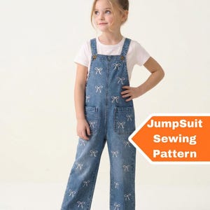 May include: A young person wearing denim overalls with white bow embroidery. The overalls have two front pockets and adjustable straps. The text "JumpSuit Sewing Pattern" is in an orange arrow.