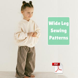 May include: A cream-coloured hooded sweatshirt with long sleeves and a front pocket paired with brown and black vertically striped wide-leg trousers. A light green rectangular graphic displays the white text Wide Leg Sewing Patterns.