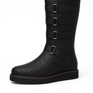 May include: Black mid-calf boot with a textured, crocodile-like pattern. The boot features three straps with silver buckles and a fourth strap at the ankle. The sole is black with white stitching.