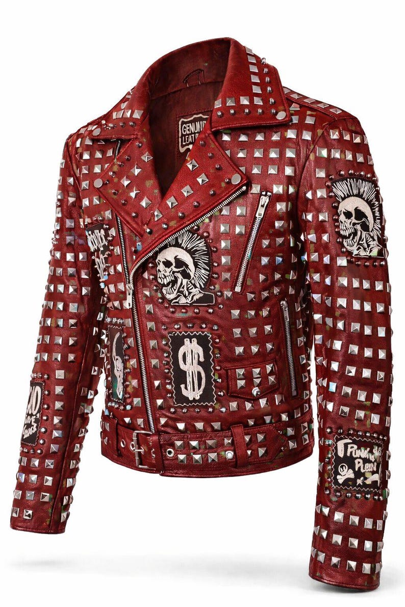 Back view of red leather punk jacket fully covered in silver metal studs arranged in a grid pattern, showing bold rocker style and detailed craftsmanship.