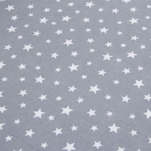 May include: A gray fabric with a repeating pattern of white stars of varying sizes. The stars are evenly distributed across the surface, creating a celestial design. The fabric appears to be soft and suitable for various crafting projects.