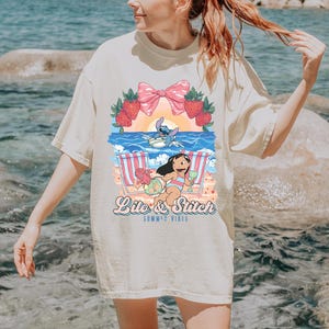 lilo and stitch summer vibes beach graphic shirt tropical vacation tee with cute beach aesthetic hawaii inspired summer sweatshirt with cartoon artwork beach vacation hoodie for tropical summer outfits cute disney inspired beach vibes t shirt coquette tropical graphic tee with strawberries and bow summer vacation outfit with tropical cartoon design beach themed summer apparel for disney lovers