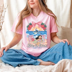 lilo and stitch summer vibes beach graphic shirt tropical vacation tee with cute beach aesthetic hawaii inspired summer sweatshirt with cartoon artwork beach vacation hoodie for tropical summer outfits cute disney inspired beach vibes t shirt coquette tropical graphic tee with strawberries and bow summer vacation outfit with tropical cartoon design beach themed summer apparel for disney lovers