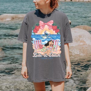 lilo and stitch summer vibes beach graphic shirt tropical vacation tee with cute beach aesthetic hawaii inspired summer sweatshirt with cartoon artwork beach vacation hoodie for tropical summer outfits cute disney inspired beach vibes t shirt coquette tropical graphic tee with strawberries and bow summer vacation outfit with tropical cartoon design beach themed summer apparel for disney lovers