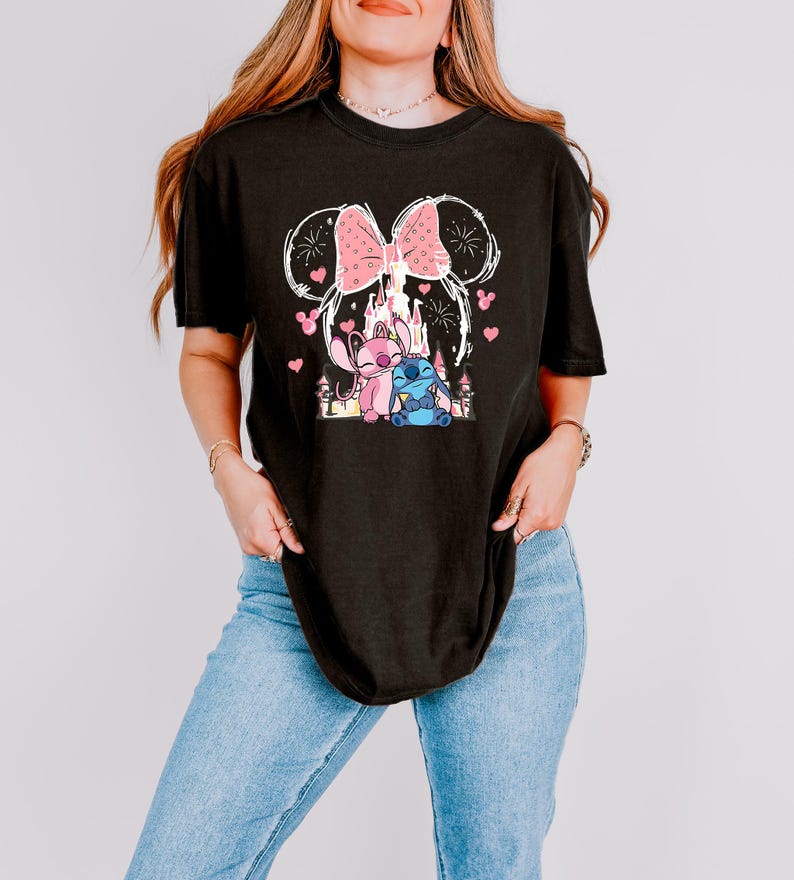 Stitch Angel castle shirt with Minnie ears and pink bow design Disney couple shirt with Stitch and Angel inspired characters pink Disney vacation tee with castle hearts and fireworks Minnie ears castle shirt with cute Stitch Angel graphic theme park outfit shirt with magical castle and pink bow Stitch and Angel Disney shirt for couple vacation outfit cute Disney lover gift shirt with castle and hearts design white Disney inspired graphic tee with Stitch Angel artwork