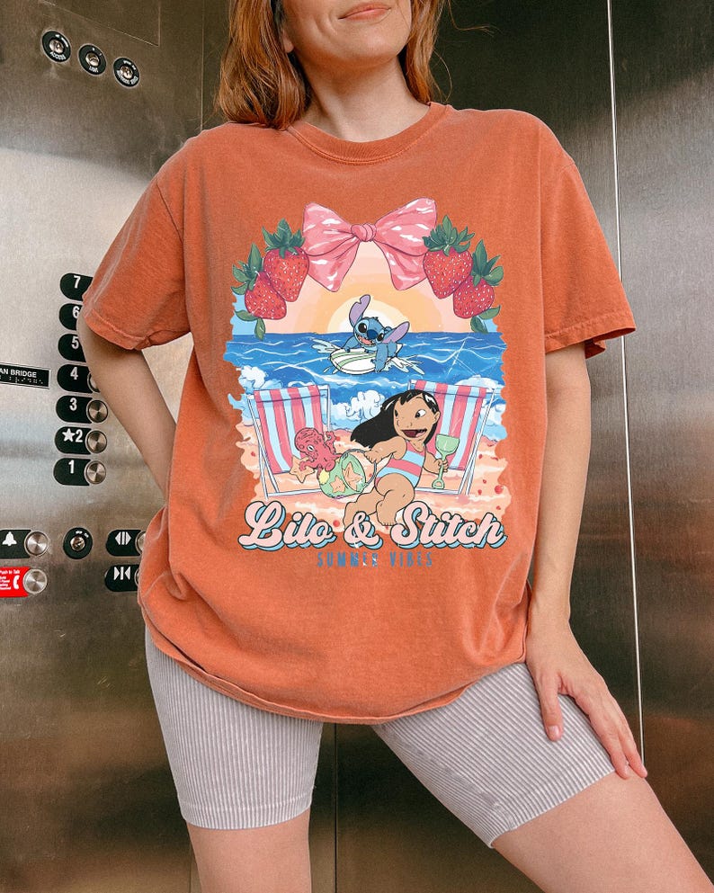 lilo and stitch summer vibes beach graphic shirt tropical vacation tee with cute beach aesthetic hawaii inspired summer sweatshirt with cartoon artwork beach vacation hoodie for tropical summer outfits cute disney inspired beach vibes t shirt coquette tropical graphic tee with strawberries and bow summer vacation outfit with tropical cartoon design beach themed summer apparel for disney lovers