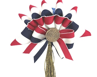 Cocade de cinta patriótica doblada