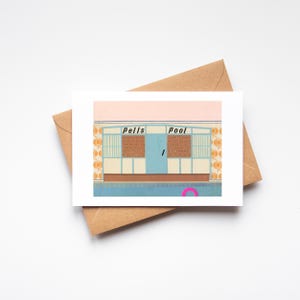 May include: A greetings card with an illustration of a swimming pool entrance, with the words "Pells Pool" above. The card has a pink sky, blue water, and is presented with a brown envelope.