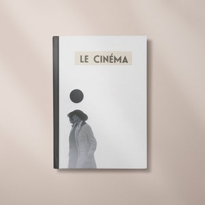 May include: A book with a white cover and black spine. The title "LE CINÉMA" is printed on a beige label. A black and white image of two people walking is on the cover. A black circle is above the image.
