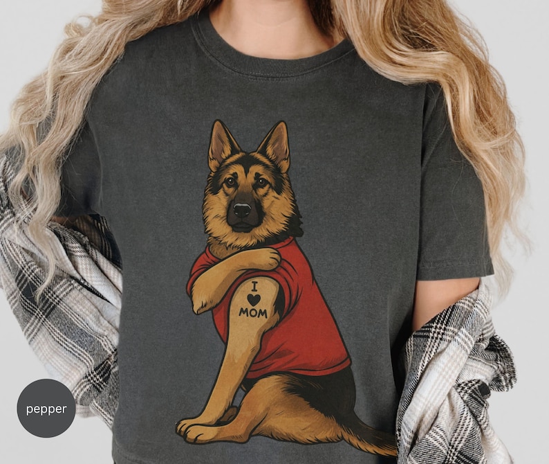 German Shepherd dog illustration wearing a red shirt, lifting sleeve to reveal “I love mom” tattoo, vintage style retro pet graphic, bold clean lines, centered composition, perfect for dog lovers and animal themed apparel designs