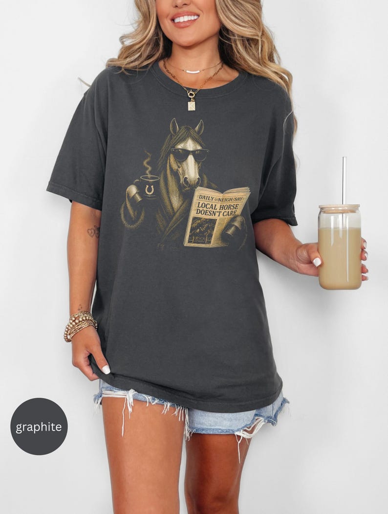 Vintage engraved horse wearing sunglasses and a robe while reading a newspaper and holding a steaming coffee mug. Humorous horse lover design featuring the headline “Local Horse Doesn't Care” in an antique newspaper style. Detailed equestrian artwork with a relaxed, unbothered attitude.