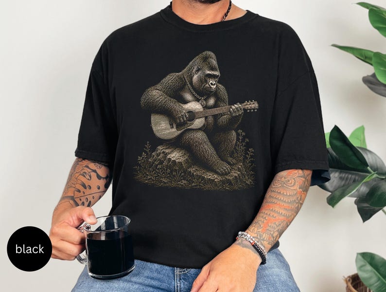 Detailed gorilla playing acoustic guitar while sitting on a rock, vintage engraving artwork for music lovers and guitar players.