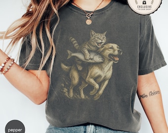 Shirt kat berijden hond met vis | Grappig vintage T-shirt | Retro shirt met kat en hond | Cadeau dierenliefhebber | Uniseks T-shirt