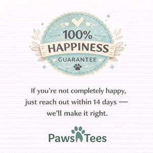 May include: A circular light blue badge with a white heart and the text 100% HAPPINESS GUARANTEE, featuring a small paw print. Below, the text reads: If you're not completely happy, just reach out within 14 days &mdash; we'll make it right. PawsTees logo.