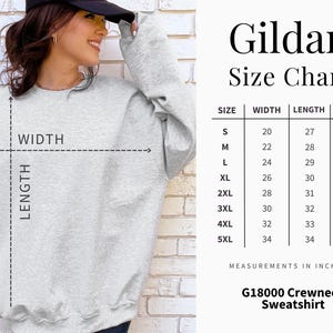 May include: A light grey crewneck sweatshirt shown with a Gildan size chart. The chart lists sizes S through 5XL with corresponding width, length, and sleeve measurements in inches. The graphic includes visual indicators for width and length.