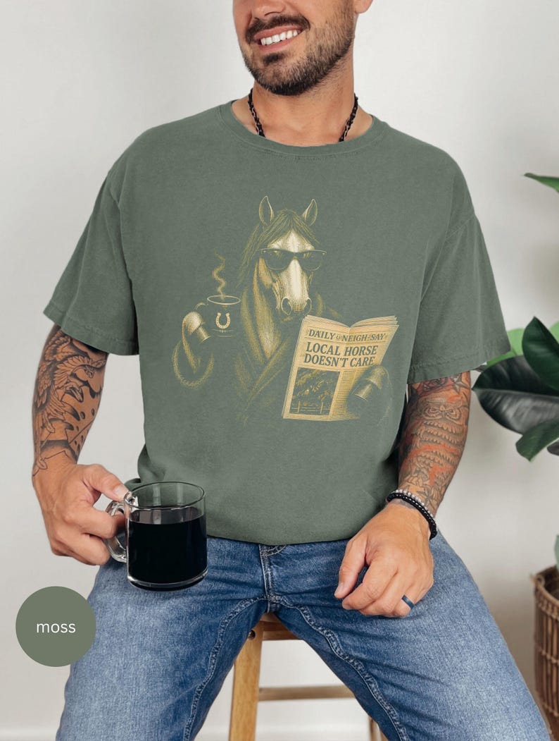 Vintage engraved horse wearing sunglasses and a robe while reading a newspaper and holding a steaming coffee mug. Humorous horse lover design featuring the headline “Local Horse Doesn't Care” in an antique newspaper style. Detailed equestrian artwork with a relaxed, unbothered attitude.