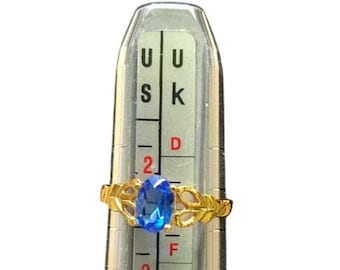 Anillo chapado en oro de 18 quilates con piedra preciosa azul, talla 2, delicado y elegante diseño de hoja.