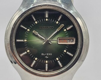 Seiko El-330 3303-8120 Electromagnetic Balance Quartz Day Date
