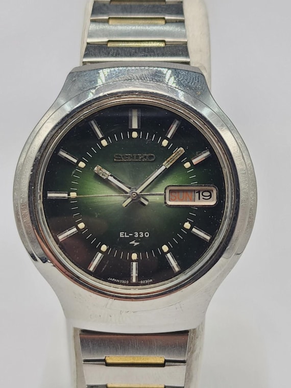 Seiko El-330 3303-8120 Electromagnetic Balance Quartz Day Date