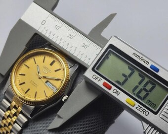 N*u様 【美品】セイコー SEIKO　セイコー5　7S26-02S0　腕時計 Boxed Seiko 5 SNXJ92 7S26-02S0 Gold Dial AT Day/date 21J Men's