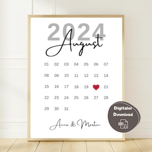 May include: A framed calendar print for August 2024, with the date 20 highlighted with a red heart. The names "Anna & Martin" are at the bottom. The print includes a "Digitaler Download" icon.