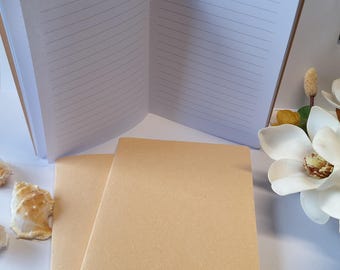 Sandy Coloured Handmade Notebooks Journals with recycled, textured covers. Earthy, wheat coloured covers, stitched spine, 60 pages inside.