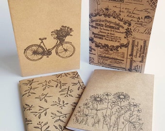 Handmade Notebook Journal A6 Kraft card cover with vintage bicycle, flowers, leaves or vintage French labels. These are handmade with love.