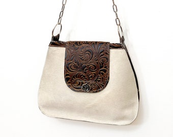 SALE** (was 158.00) -- Structured white hair-on cowhide purse with tooled brown flap and trim, chain and leather strap