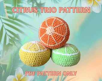 May include: Three crocheted citrus fruit-shaped items: an orange, a lemon, and a lime. The orange is orange with white accents, the lemon is yellow with white accents, and the lime is green with white accents. The text "CITRUS TRIO PATTERN" and "PDF PATTERN ONLY" are displayed.
