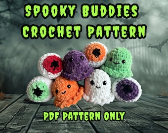May include: A collection of handmade crochet plushies in various colors, including purple, orange, green, and white, with smiling faces and eye designs. The text "Spooky Buddies Crochet Pattern" and "PDF Pattern Only" are displayed.
