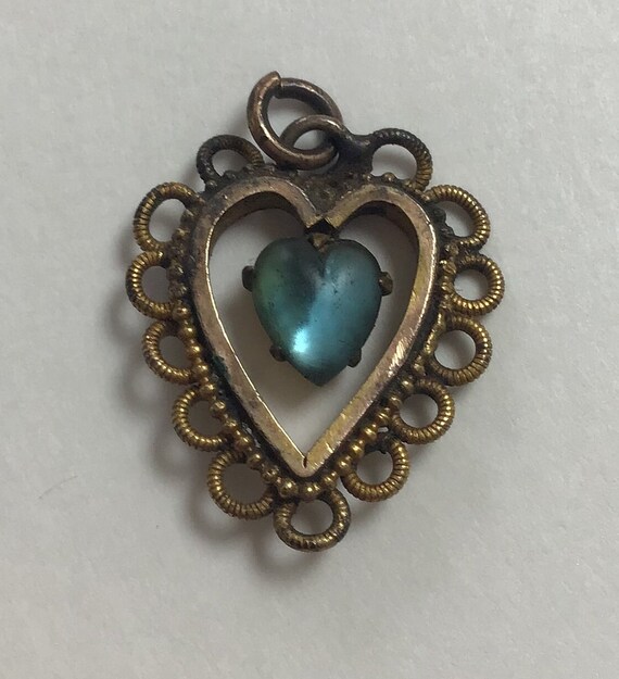 Antique sapphire heart pendant in brass setting - image 1
