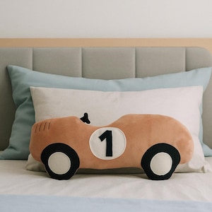 Handmade race car shaped pillow in light brown color, motorsport bedroom decor, gift for car lover