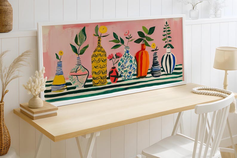 a painting on a wall next to a table